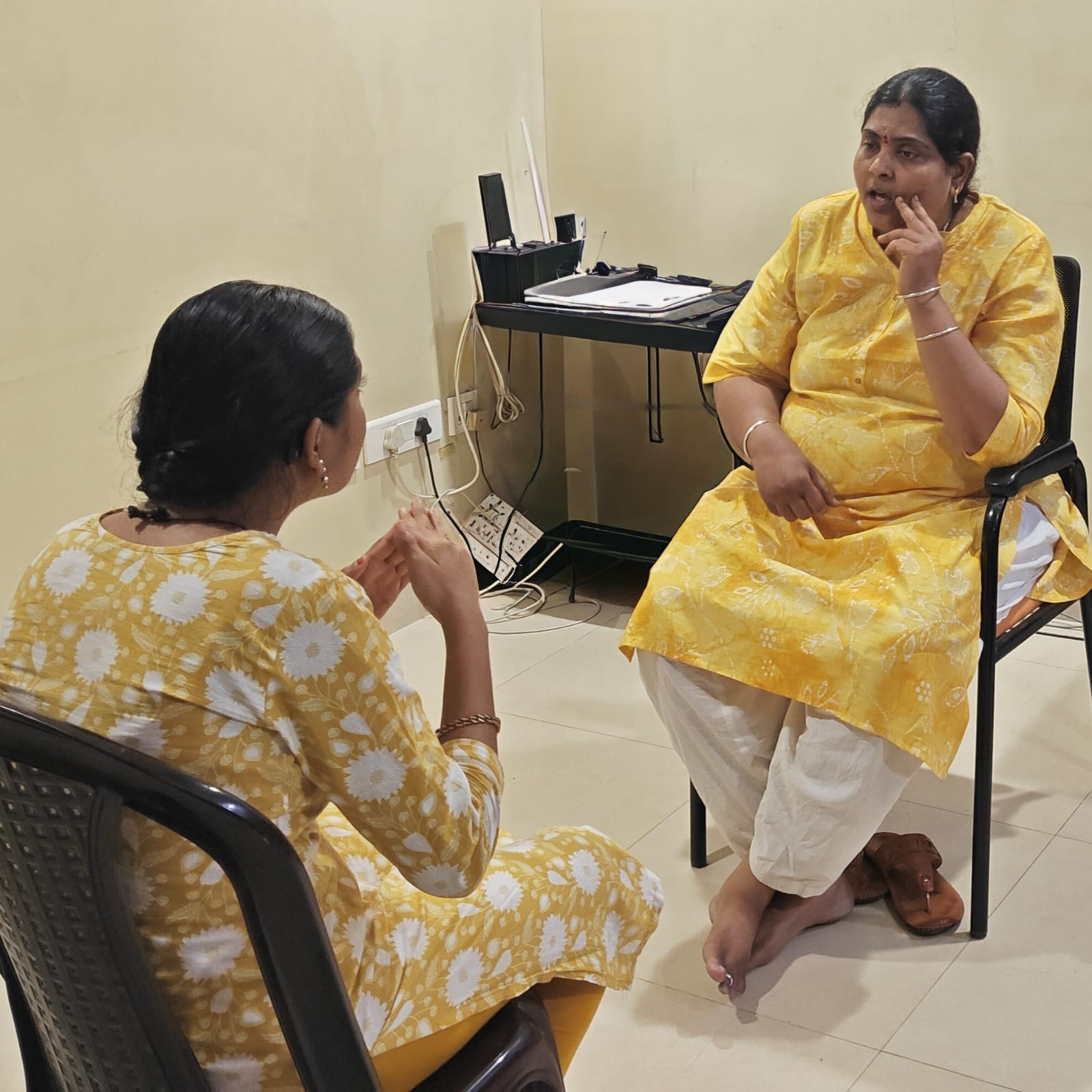 A counsellor listening attentively during a supportive conversation